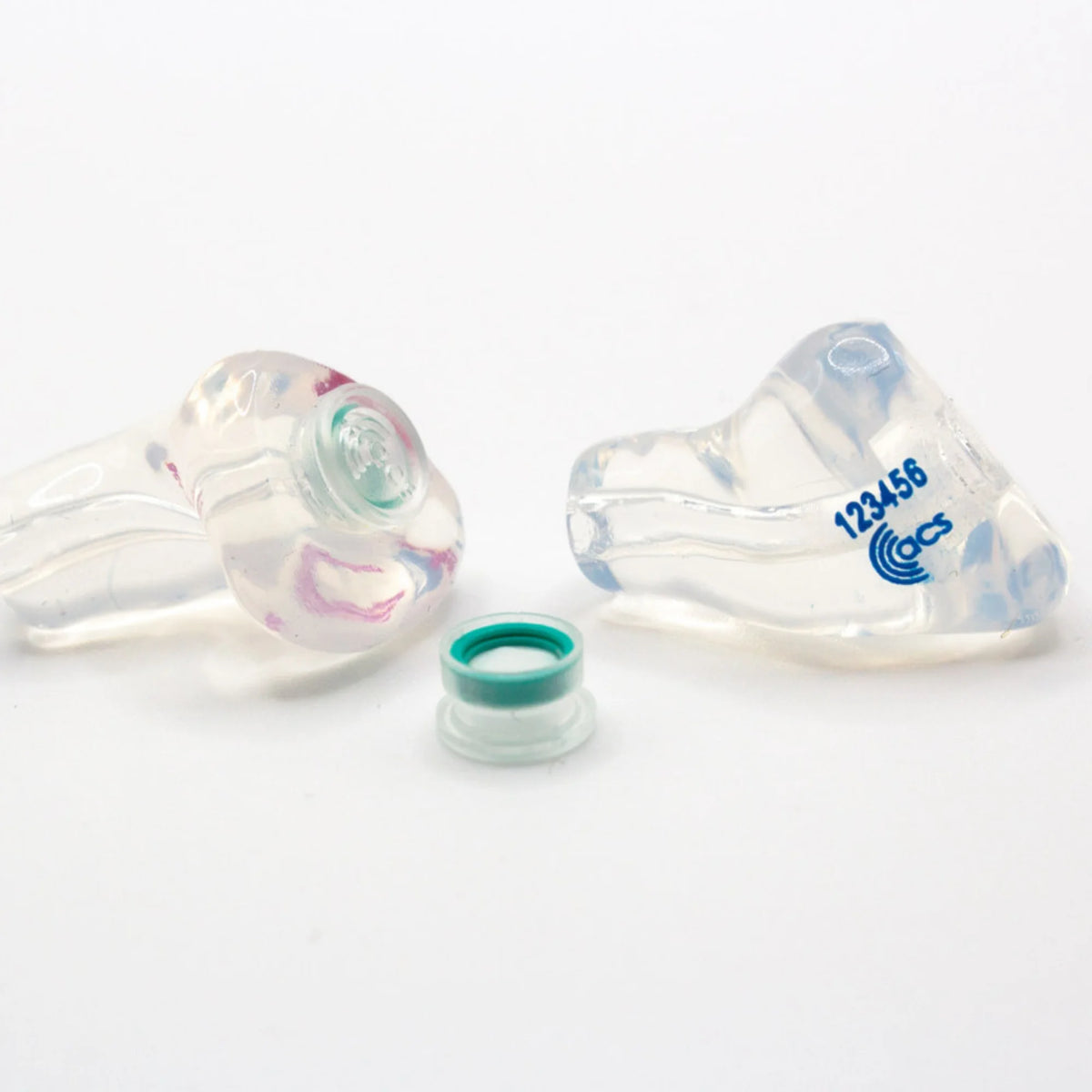 Pair of clear earbuds with colorful accents on a white background