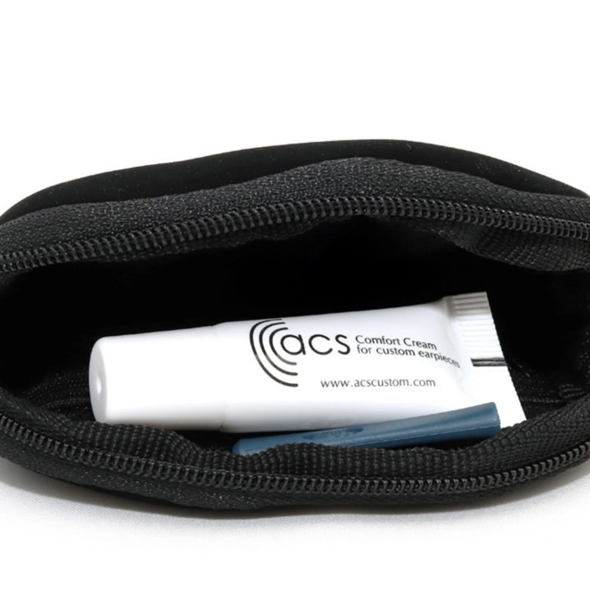 Black zippered pouch containing a tube of ACS Comfort Cream on a white background