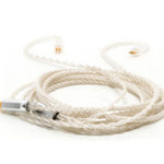Coiled cable with metal connector on a white background
