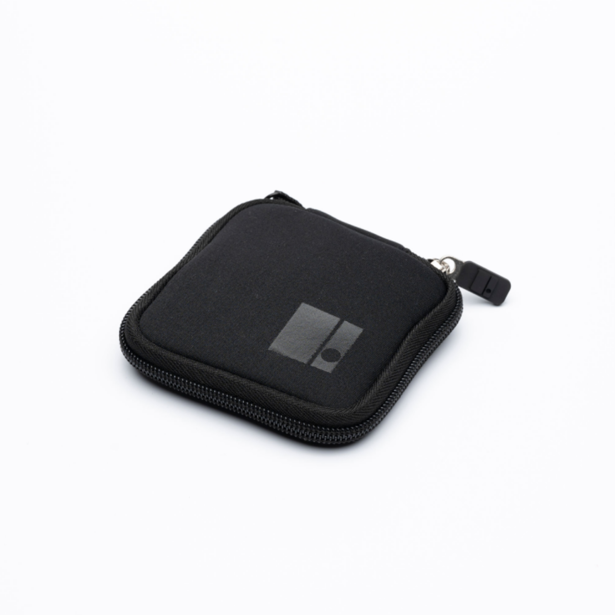 A small black zippered neoprene pouch with a square logo patch, shown on a clean white background.