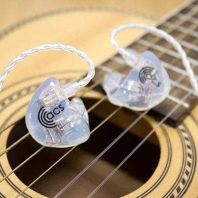 In-ear monitors on an acoustic guitar