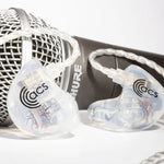 Clear earbuds with 'acs' logo on a white background