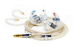 A pair of transparent in-ear monitors with white braided cable, gold-plated 3.5mm jacks, and clear ear tips, displayed on a white background.