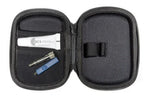 An open black zippered hard case showing its interior layout, containing a white tube labeled GCS, a small metal tool, and a blue accessory, photographed on a white background.