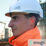 Person wearing a white hard hat and orange safety jacket with 'snugs' logo.