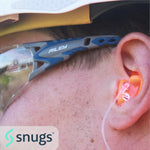 Person wearing sunglasses with a 'Riley' brand logo and an ear with a 'snugs' product in it.